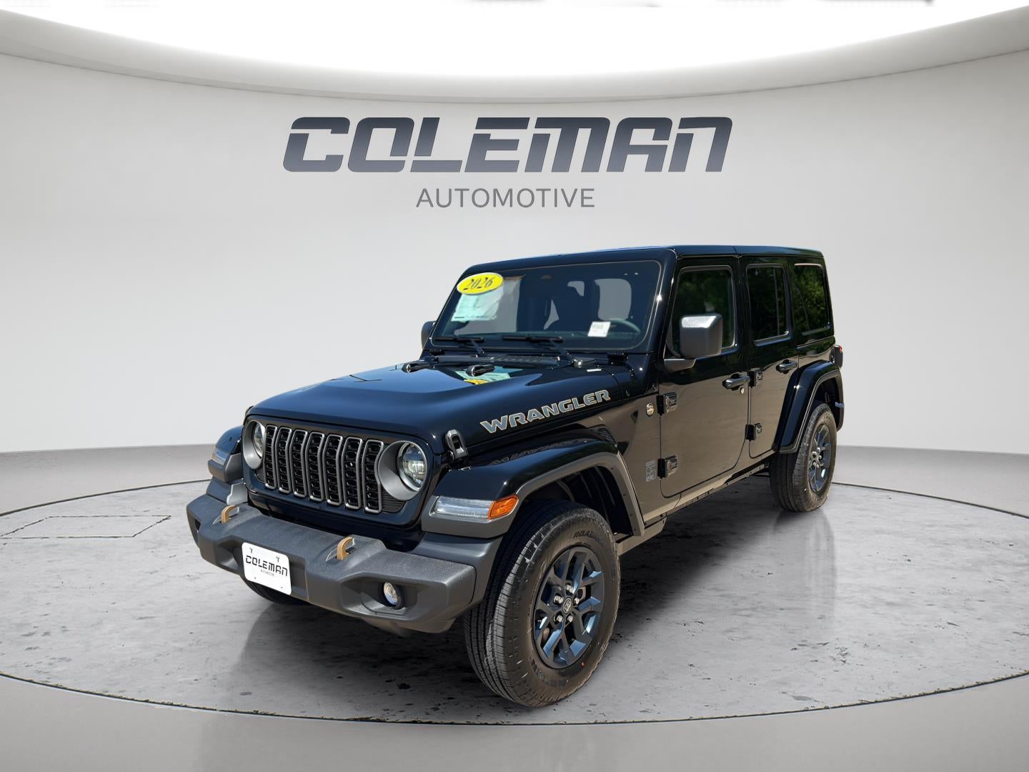 2026 Jeep Wrangler WRANGLER 4-DOOR 85TH ANNIVERSARY EDITION in Black Clear-Coat Exterior Paint — front three-quarter view