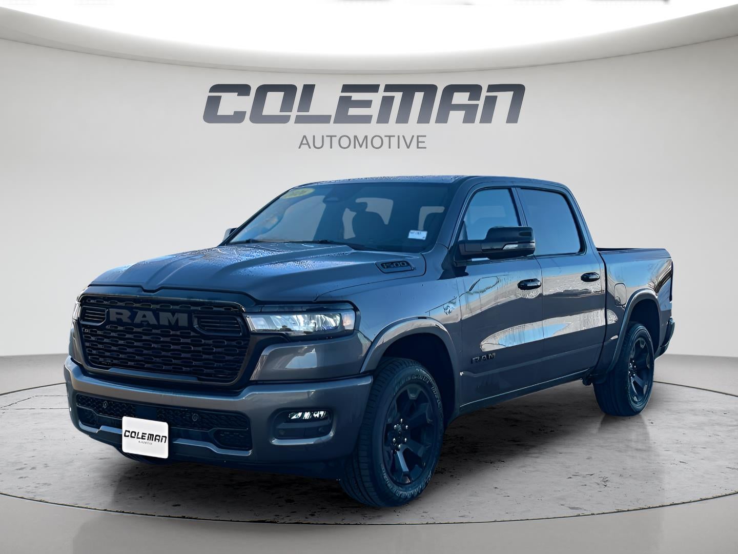 2026 RAM Ram 1500 RAM 1500 BIG HORN CREW CAB 4X4 5'7' BOX in Granite Crystal Metallic Clear-Coat Exterior Paint — front three-quarter view