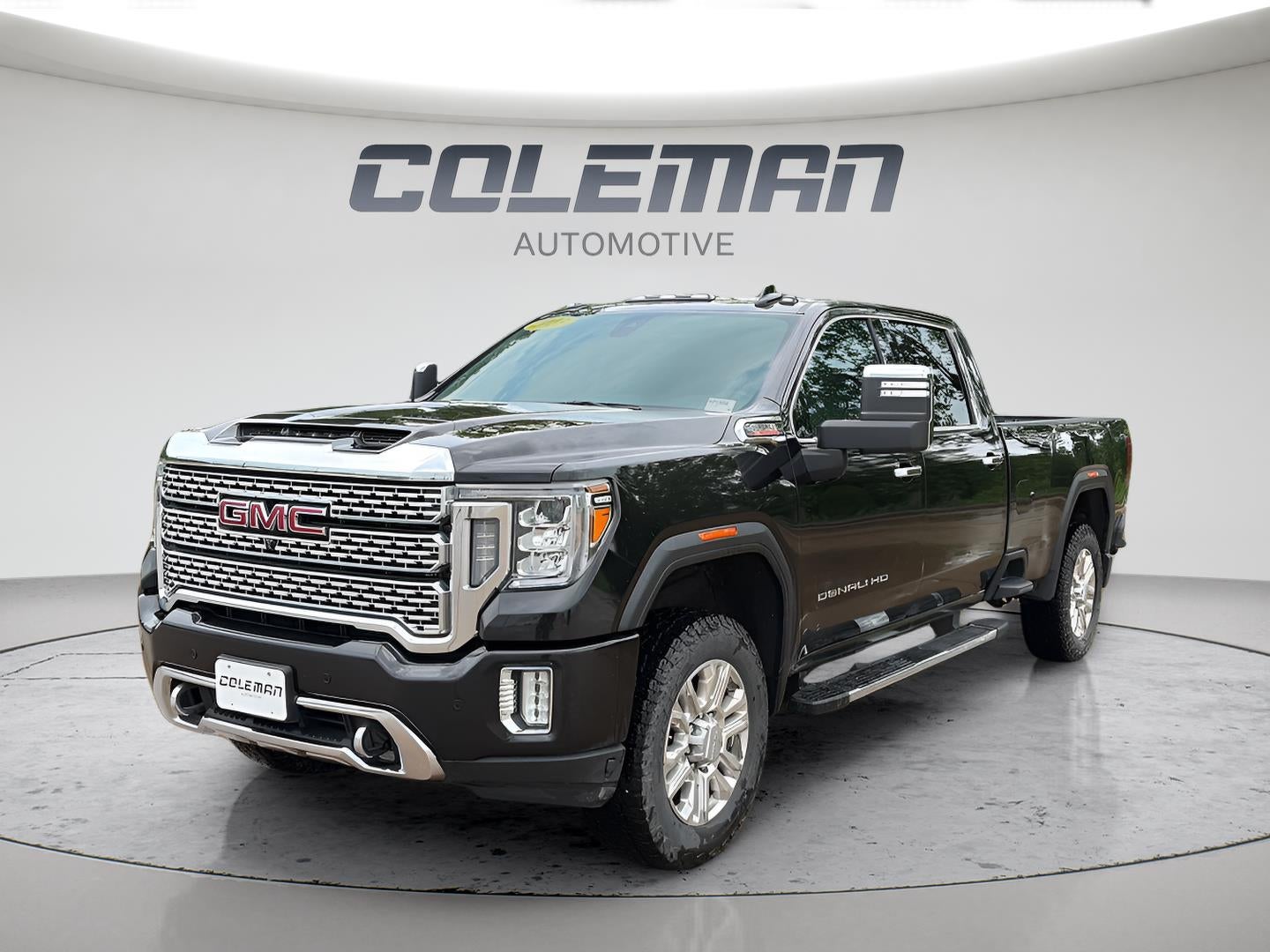 2023 GMC Sierra 3500HD 4WD Crew Cab Long Bed Denali in Ebony Twilight Metallic — front three-quarter view