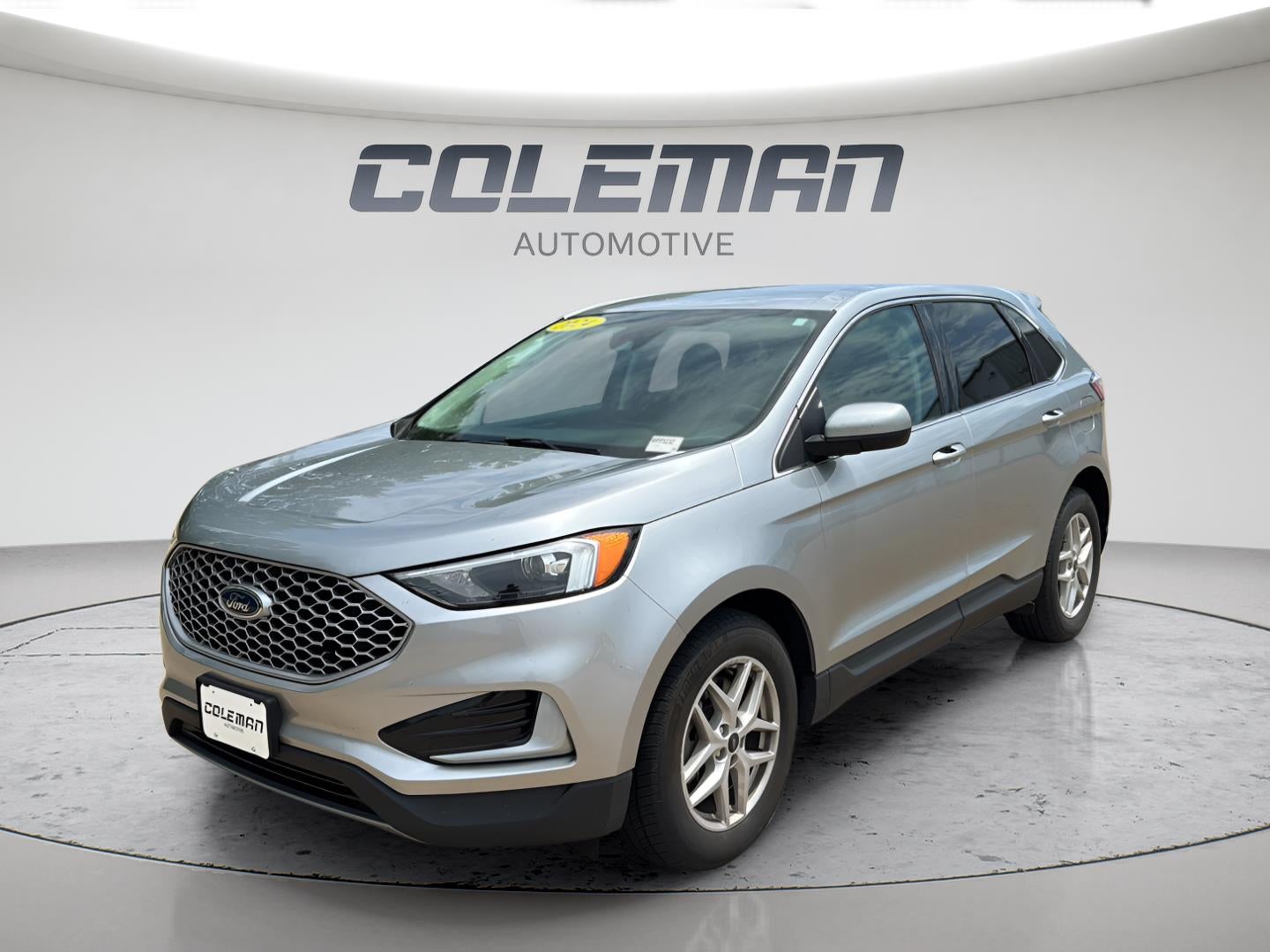 2024 Ford Edge SEL in Iconic Silver — front three-quarter view
