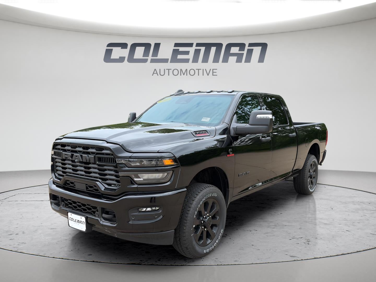 2026 RAM Ram 3500 RAM 3500 BIG HORN CREW CAB 4X4 6'4' BOX in Diamond Black Crystal Pearl-Coat Exterior Paint — front three-quarter view