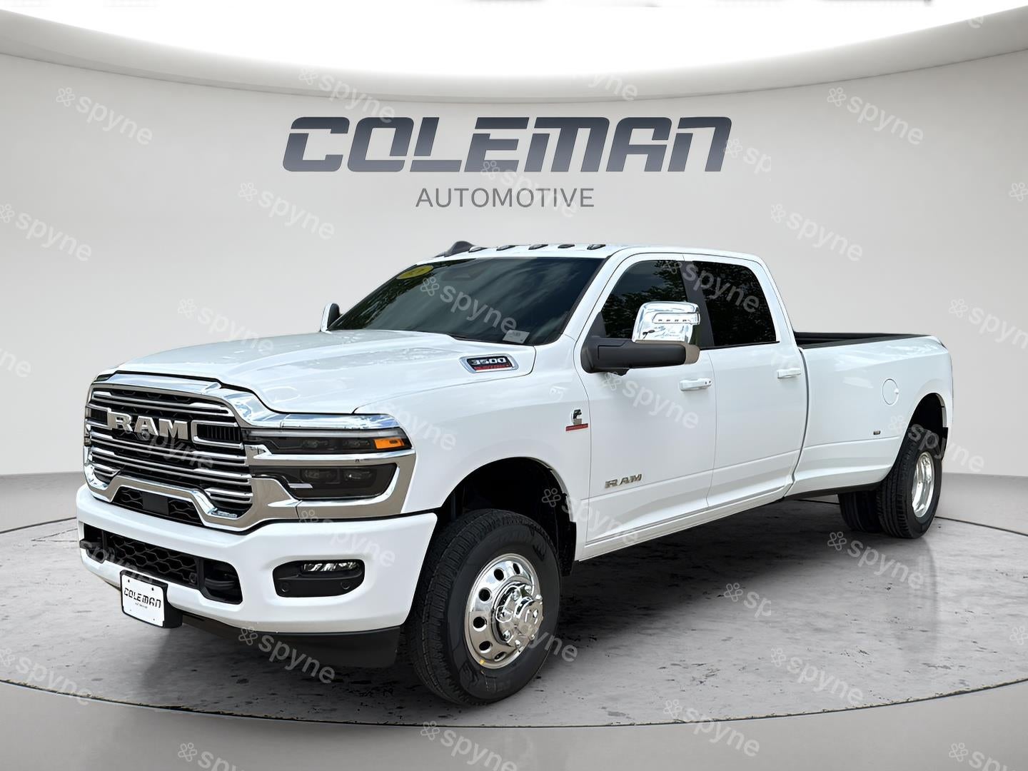2026 RAM Ram 3500 RAM 3500 LARAMIE CREW CAB 4X4 8' BOX in Bright White Clear-Coat Exterior Paint — front three-quarter view